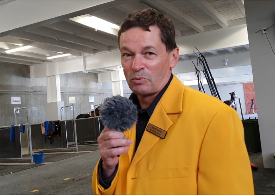 Nigel in Yellow Suit with Microphone